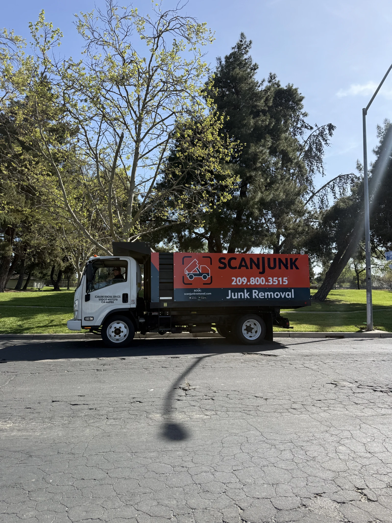ScanJunk crew with branded truck in Stockton