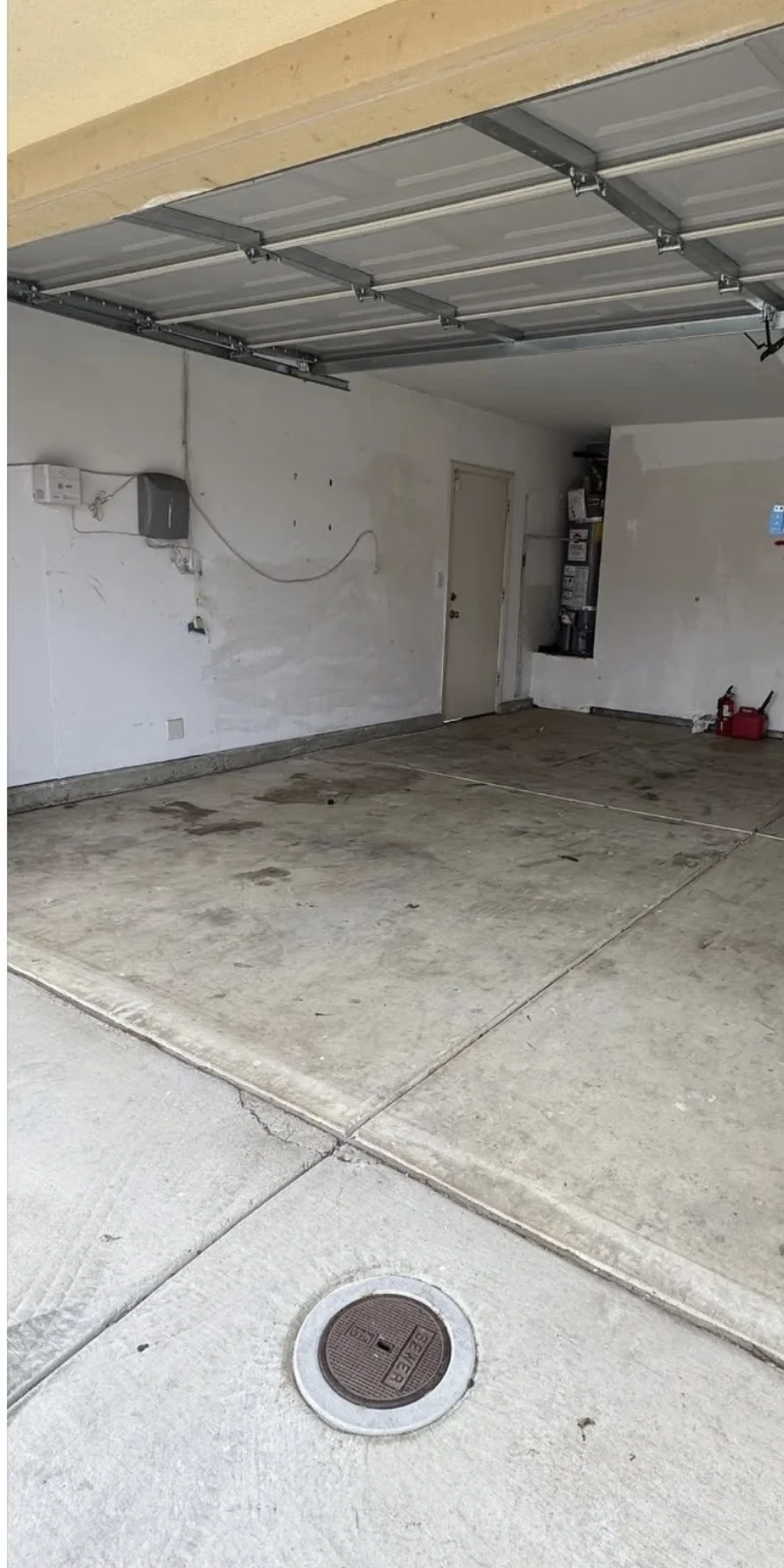 Clean empty garage after full cleanout by ScanJunk Removal in Stockton